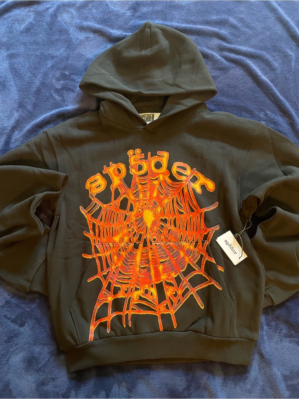 Black Hoodie with Vibrant Orange Spider-Web Graphic
